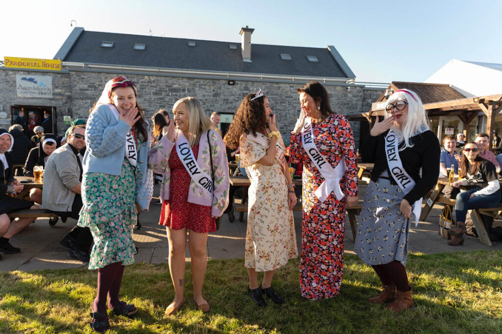 TedFest Lovely Girls Mary O Keefe, Sinead Sweeney, Rachel Manning, Catherine Sheils and Jess Forde picture practicing their lovely laughs at the Lovely Girl Parade. TedFest is back on March 2nd-5th 2023 on Inis Mor in the Aran Islands which becomes the legendary Craggy Island every year. Copious cups of tea and sandwiches, a lot of red tank-tops, nuns on the run, priests on the pull, map-cap costumes and of course a bishop getting a kick up the arse - Fr Ted, Ireland’s best loved TV Show is celebrated in the most wild and wonderful way. see www.tedfest.org . Picture by Matt Sills