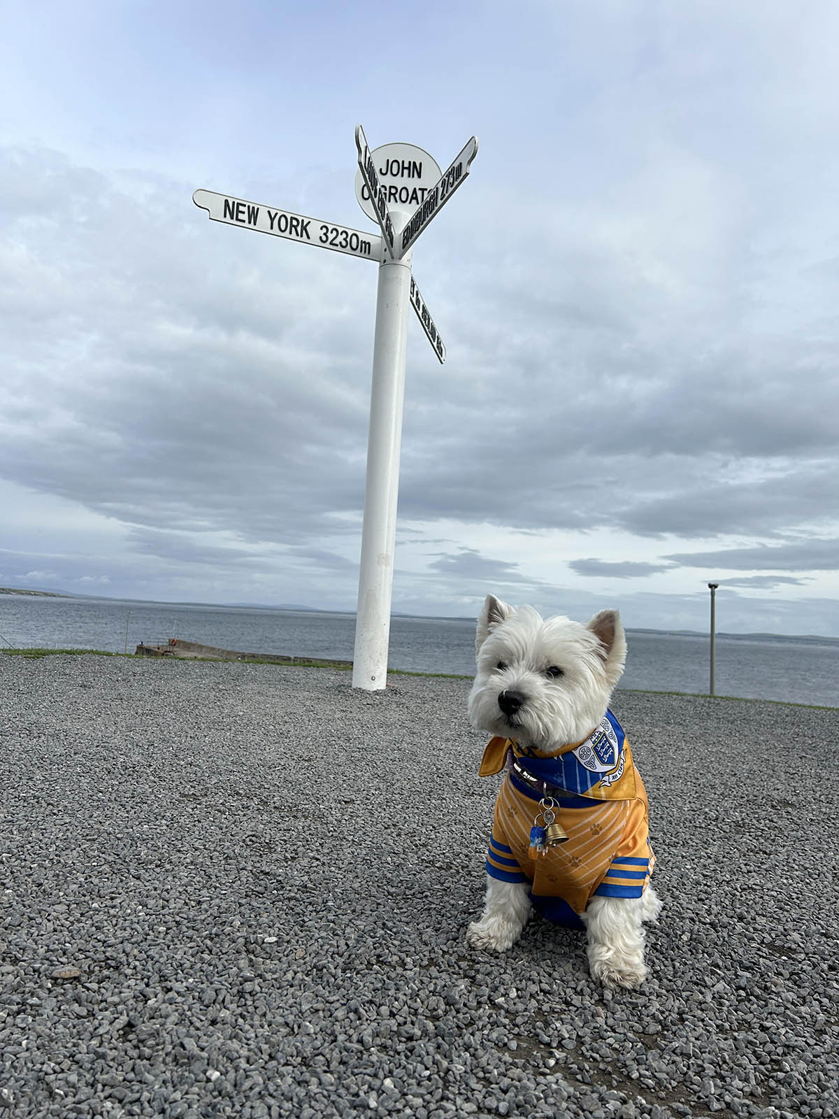 Proudly wearing my Banner jersey and bandana at John o'Groats.